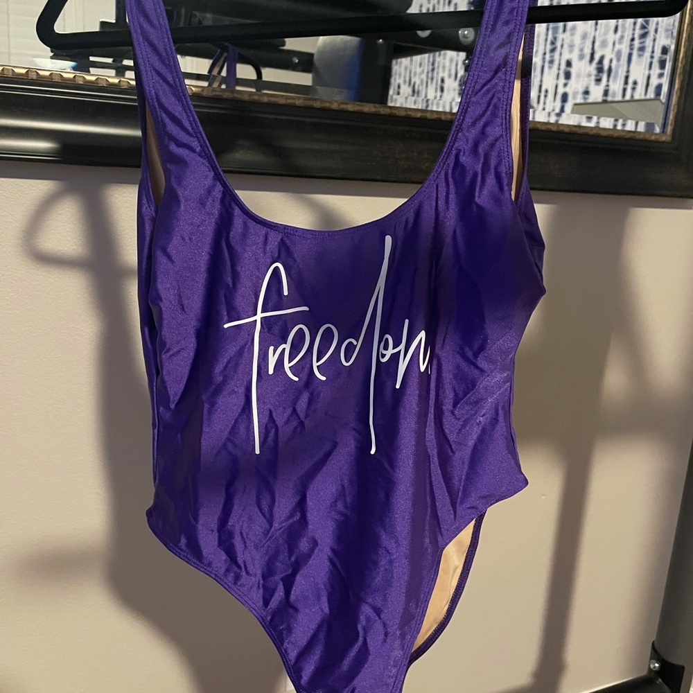 Super cute & flattering; Ravesuit brand